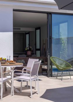 Stylish,Outdoor,Seating,Area,Connected,To,A,Modern,Living,Space